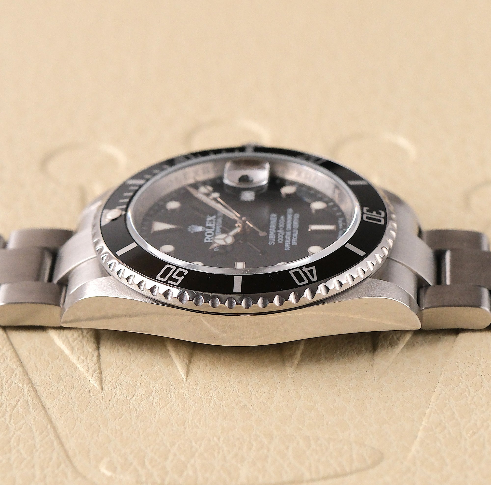 SOLD Rolex Submariner 16610 M-Serial – Engraved Rehaut – Card