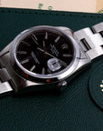 SOLD Oyster Perpetual Date / serviced / black dial 15200