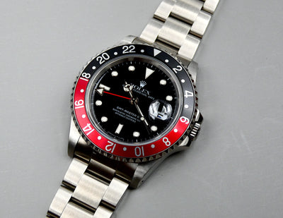 SOLD  Rolex GMT-Master II Coke / 1993 / Mint