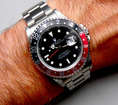 SOLD  Rolex GMT-Master II Coke / 1993 / Mint