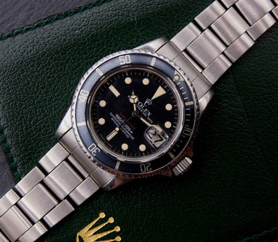 SOLD Rolex Submariner Date / Single Red / 1974 / blue faded bezel